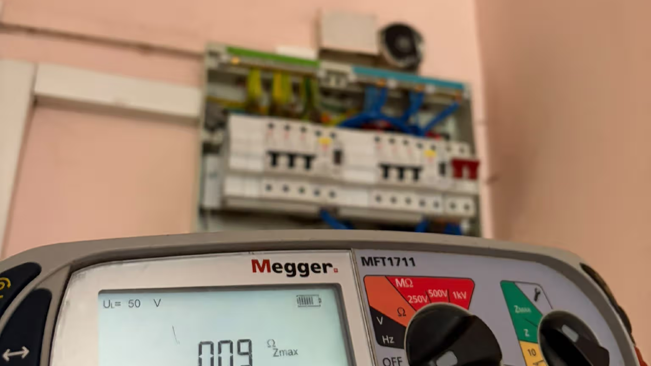 Electrical engineer carrying out electrical inspection and testing
