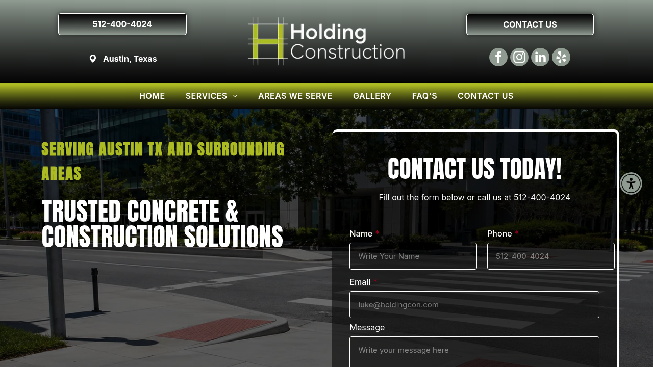 Holding Construction professional concrete services